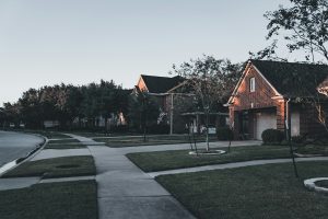 suburban street with lawns